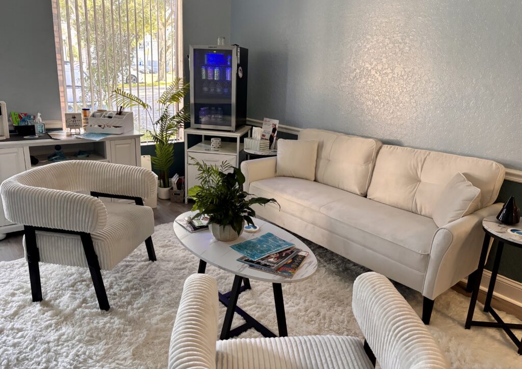 Reflected Wellness's lobby with couches and chairs